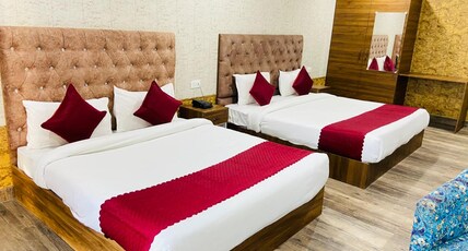 Riviera Inn with Ganga View Room Type - Family Room with 2 Beds