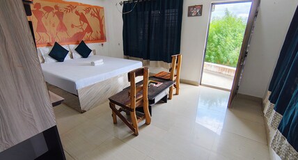 STAYMAKER Gharana Hotel and Resort Room Type - Deluxe Room AC
