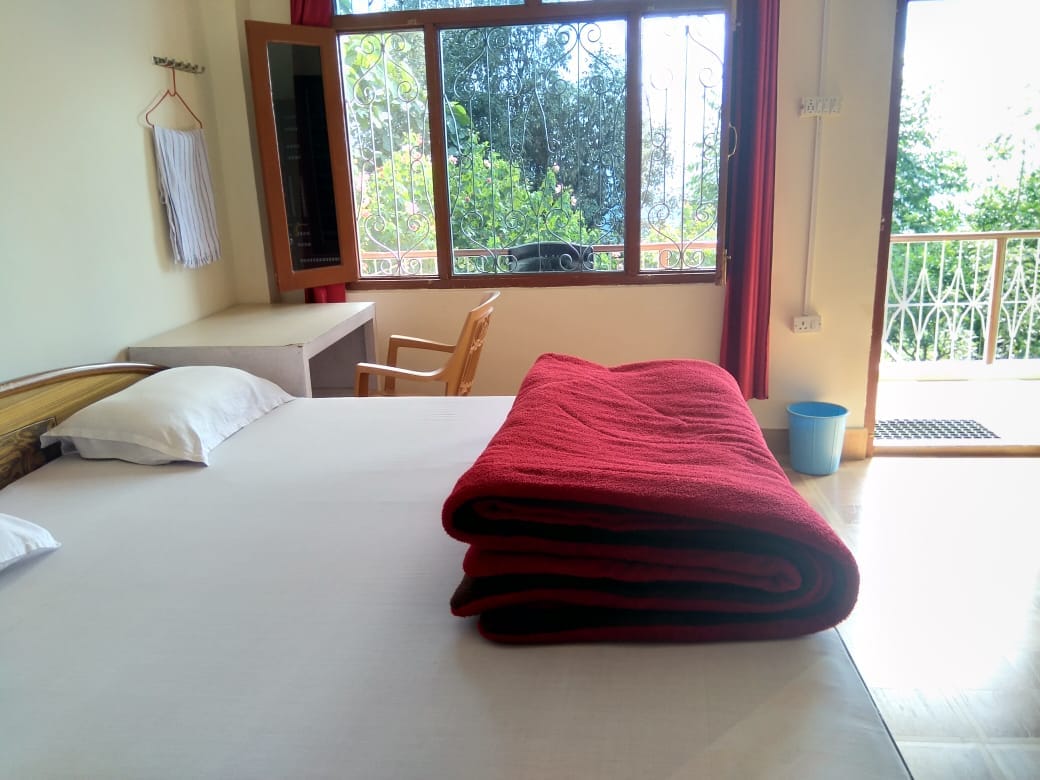 Maa Anandamayee Guest House - Tap to explore photos
