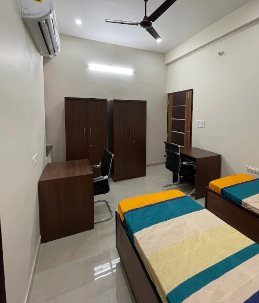 Pink Ribbon Girls Hostel - Tap to explore photos