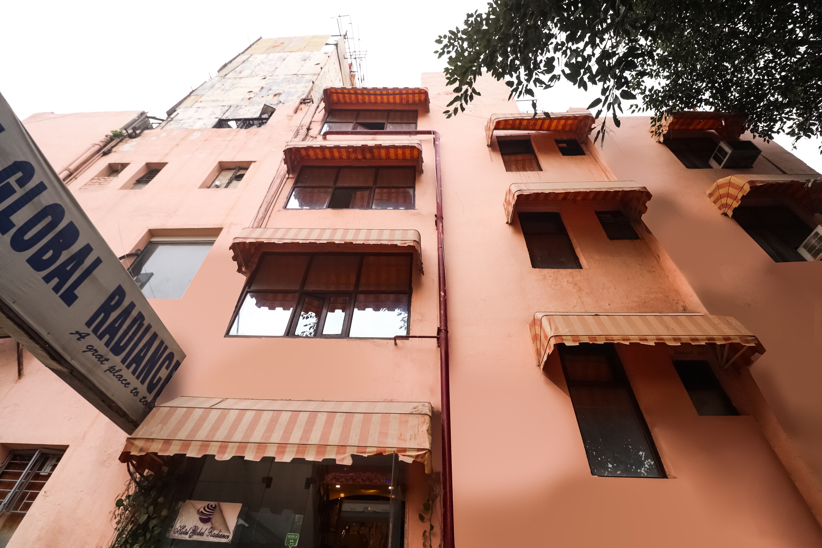 Hotel O Global Radiance - Tap to explore photos