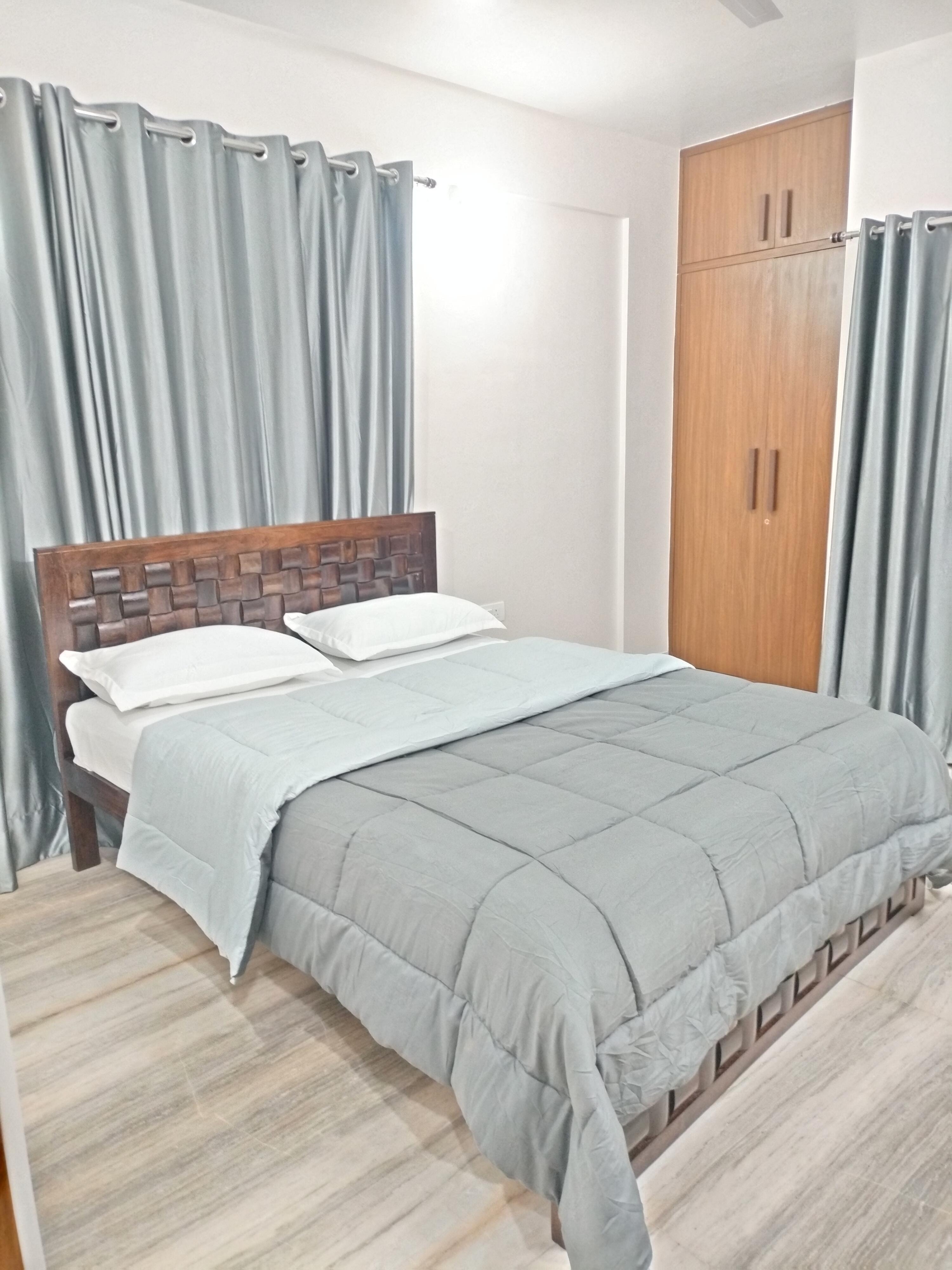 Modern 2BHK AC WiFi Parking | Nirmal Heights 102 - Tap to explore photos