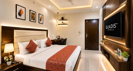 Hotel Amby Inn by Quadis - Lajpat Nagar Room Type - Deluxe Room