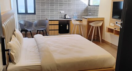 The Whispering Winds Resorts Room Type - Premium Studio Suite with private Kitchen and Balcony