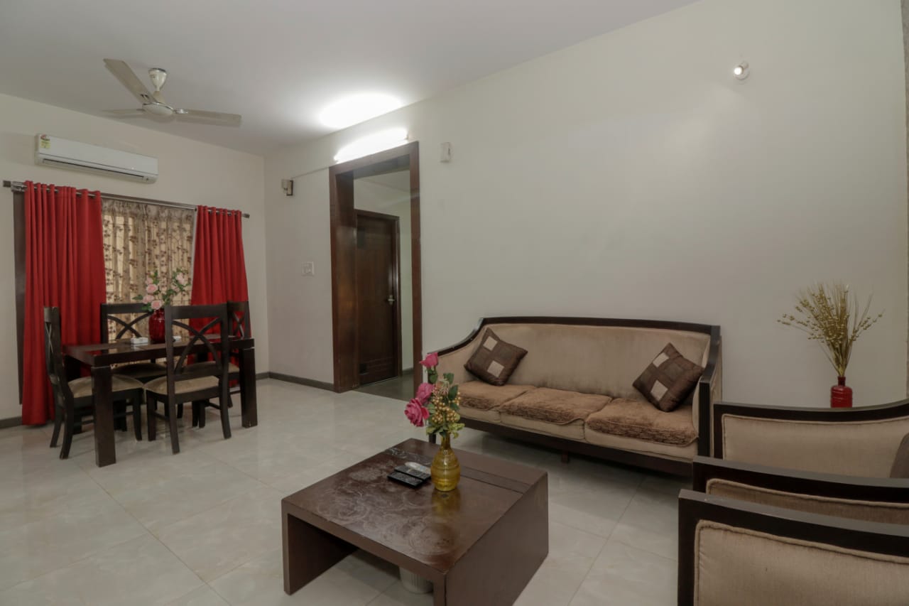 Pink Petals service Apartment by WB Hotels - Tap to explore photos
