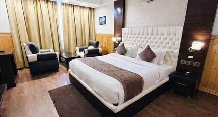 Hotel Dhroov Near Mall Road By Mystical Views Room Type - Premium Room - Partial View - With Parking Hotel Dhroov Near Mall Road By Mystical Views Room Type - Premium Room - Partial View - With Parking