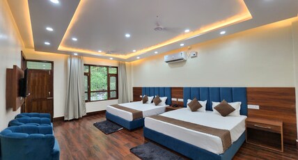 Hotel Robo Nest Room Type - Family Room | Balcony and Hill View
