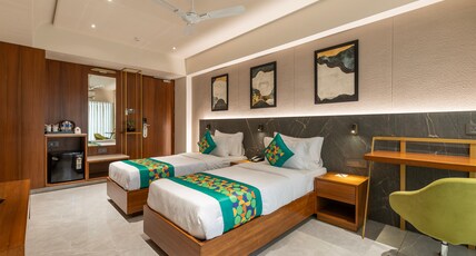 Treebo Premium Paradise Room Type - Deluxe Room