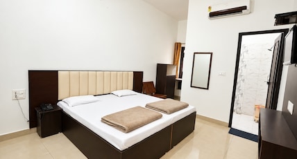 Hotel Moksha (500m From Ram Jhula) Room Type - Deluxe without Balcony Hotel Moksha (500m From Ram Jhula) Room Type - Deluxe without Balcony