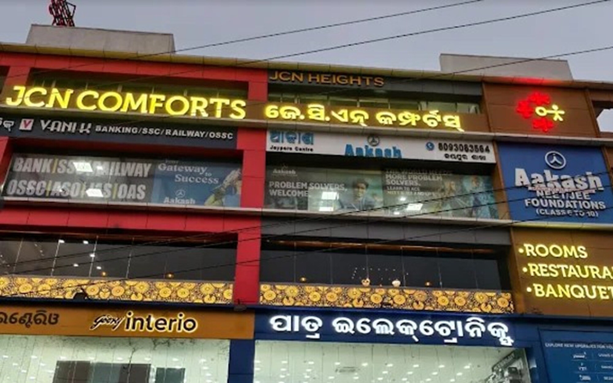 Hotel JCN Comforts - Tap to explore photos