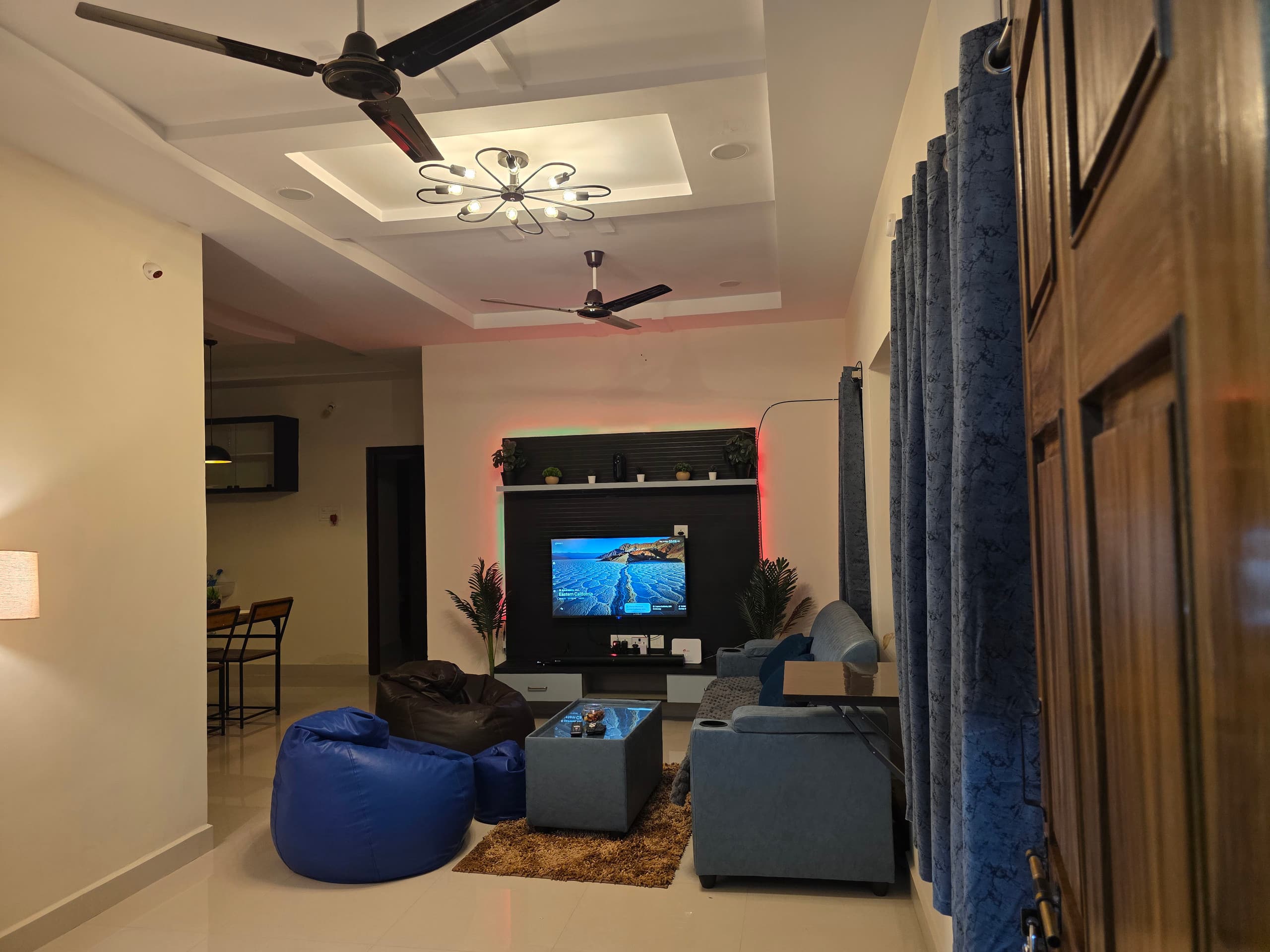 VK Homestays Modern 2BHK with Projector OTT - Tap to explore photos