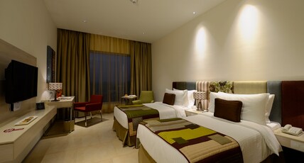 Pride Elite Phaltan Room Type - Deluxe King Room