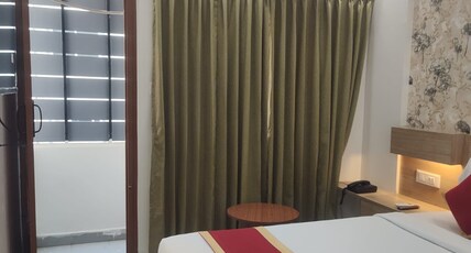 Sri Sai Comforts Manyata Tech Park Room Type - Deluxe Double Room with Balcony