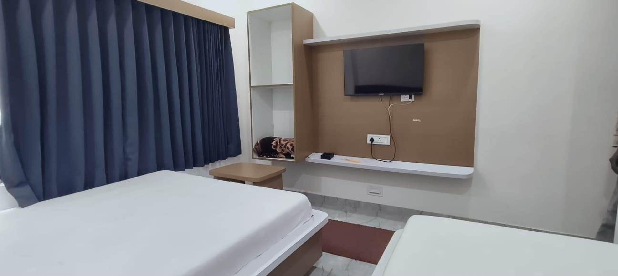 Hotel Radhe Inn - Tap to explore photos
