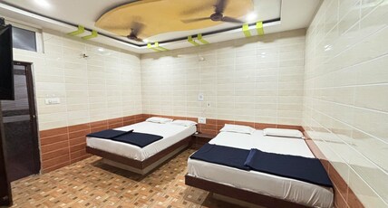 Sreeniketanam Lodge Room Type - Deluxe Four Bed Room Ac Room (Check-in 8 AM, Check-out 6 AM) Sreeniketanam Lodge Room Type - Deluxe Four Bed Room Ac Room (Check-in 8 AM, Check-out 6 AM)