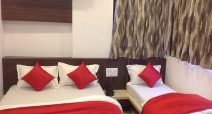 Hotel Sunrise Maninagar Room Type - deluxe room