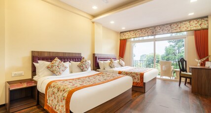 Summit Barsana Resort & Spa (5 Mins drive to Mall) Room Type - Family Mountain View Room with Private Balcony Summit Barsana Resort & Spa (5 Mins drive to Mall) Room Type - Family Mountain View Room with Private Balcony