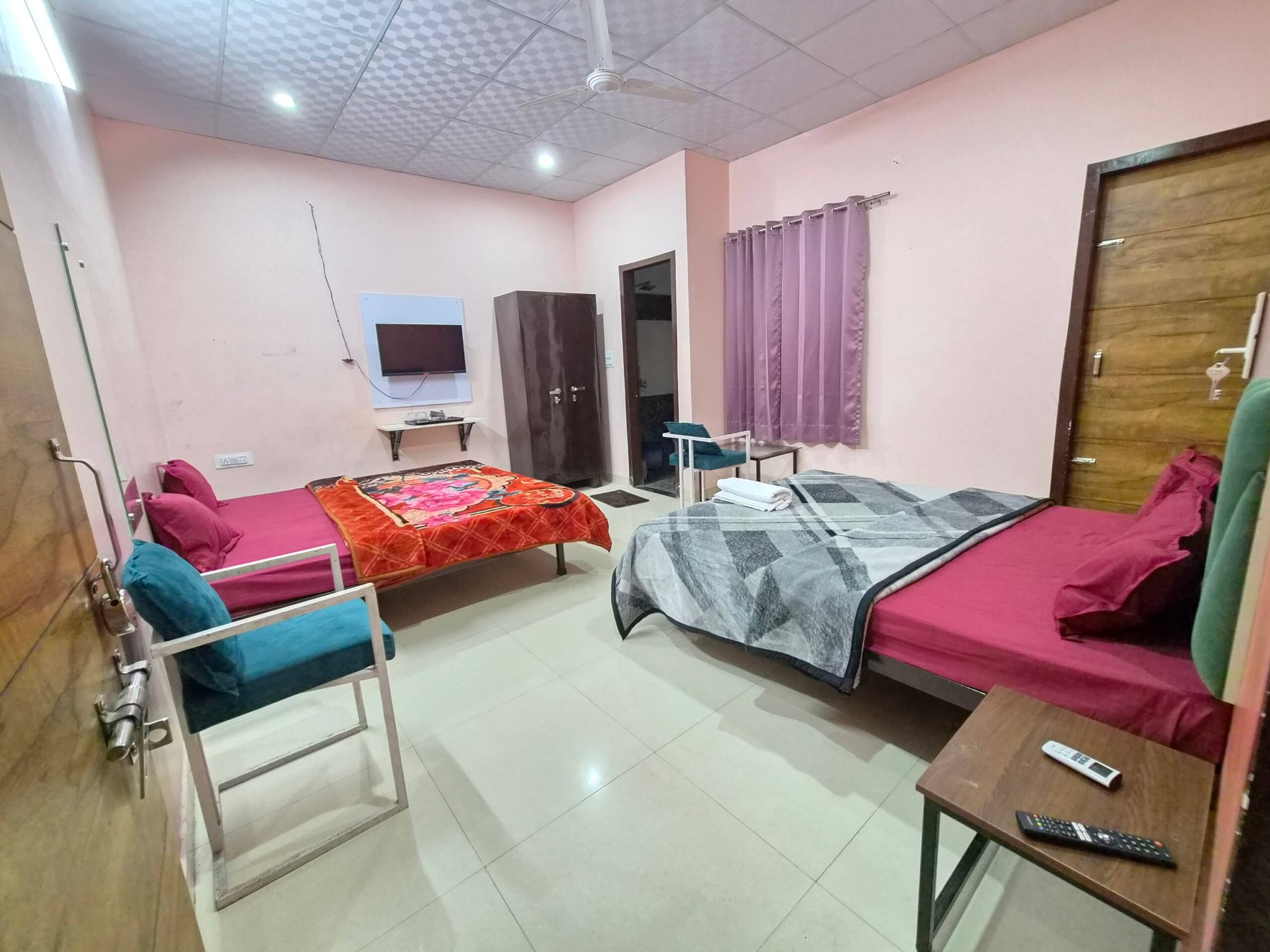 Delight hotel 205 Stay airport budget room - Tap to explore photos