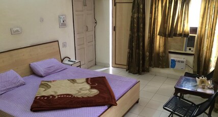 Hotel Lily  Room Type - Deluxe Room A/C