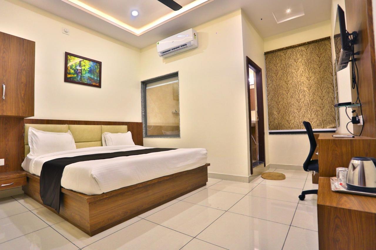 Hotel Shree Dev Prime - Tap to explore photos