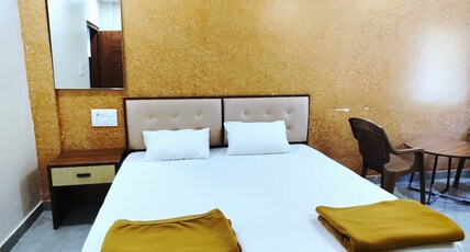Devi Grand Lodge Room Type - Non AC Double Bed Room