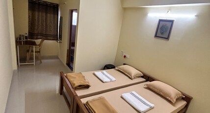 Shubham Suites & PartyHall Room Type - Family Room Non AC (Four bed)