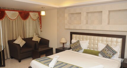 SUVARNA REGENCY Room Type - Deluxe AC