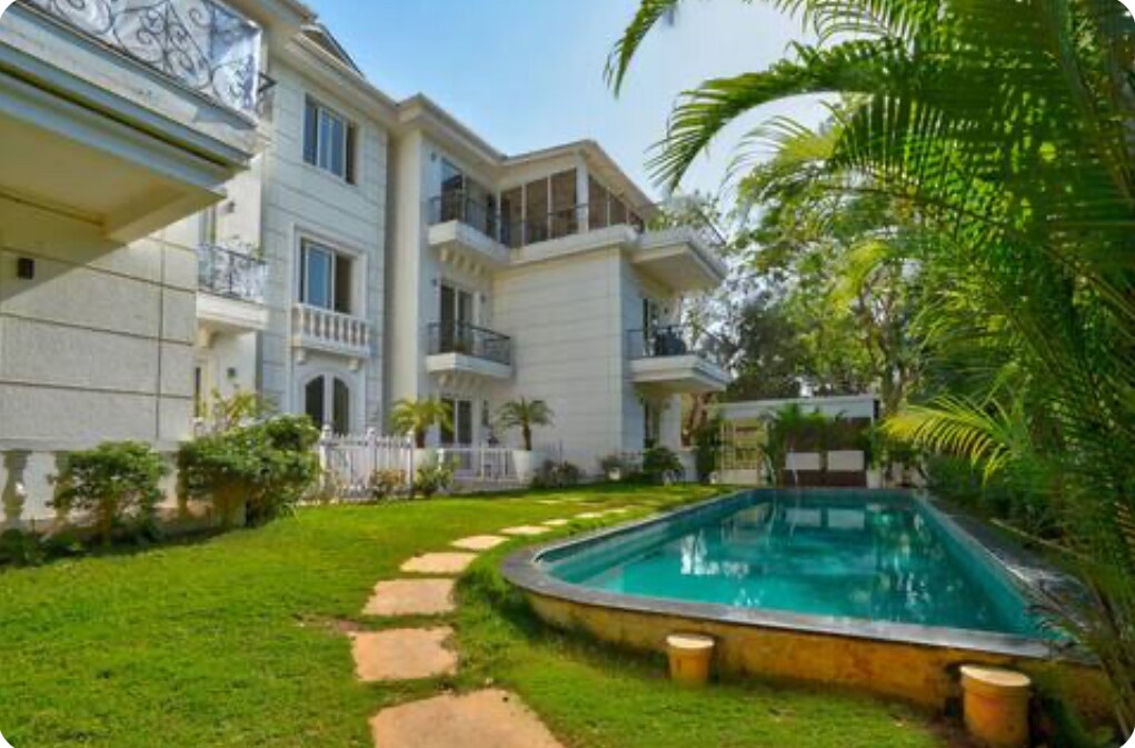 Havenwood -2BHK Pool Facing Green Getaway - Tap to explore photos