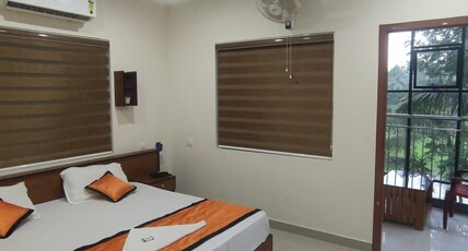 PMS Dhabi Residency Room Type - Standard Double Room with fan