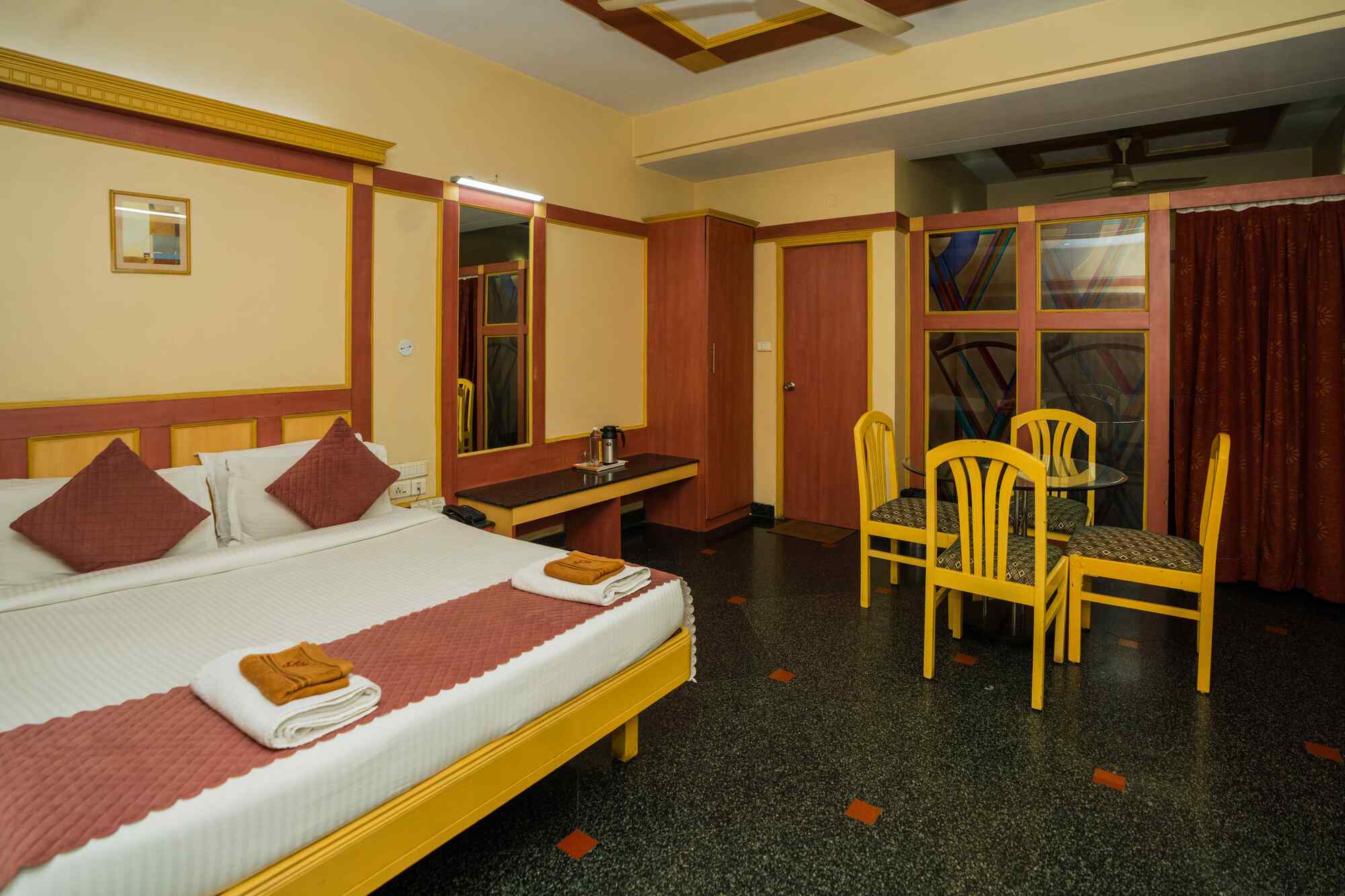 FabHotel Raj Inn- Nr. KIMS - Sunshine Hospitals, Begumpet - Tap to explore photos