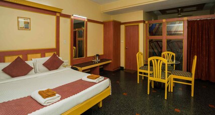 FabHotel Raj Inn- Nr. KIMS - Sunshine Hospitals, Begumpet Room Type - Deluxe Room