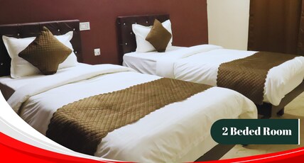 HOTEL POSH Room Type - AC Deluxe King bed Room