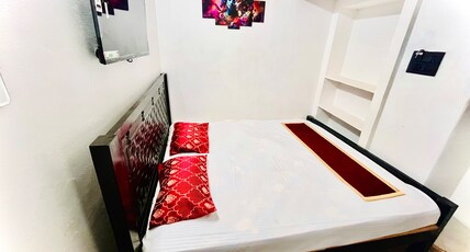 Aura Residency Room Type - Diuble cot Bedroom AC