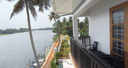 JMJ Riverview Room Type - Elegant Riverview Balcony AC Room