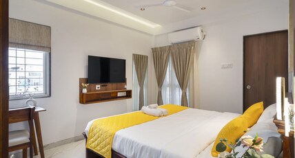 Marvel Inn Room Type - Deluxe Queen Bed Room with Balcony