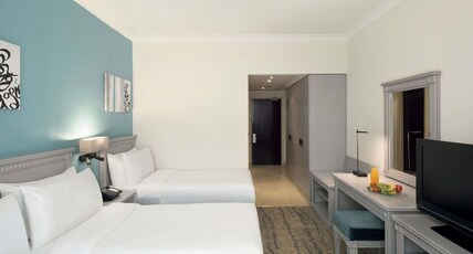 Anwar Al Madinah Movenpick Hotel Room Type - Classic 4 Beds