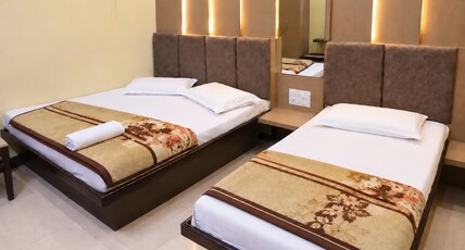 Hotel Mittal Inn Room Type - Luxury Three Bed Super Deluxe A.C. Hotel Mittal Inn Room Type - Luxury Three Bed Super Deluxe A.C.