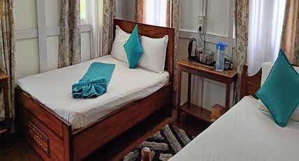 Woodpecker Nest Room Type - Twin Bedded Room