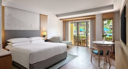 Phuket Marriott Resort & Spa, Merlin Beach Room Type - Larger Guest room, 1 King, Pool view, Terrace Phuket Marriott Resort & Spa, Merlin Beach Room Type - Larger Guest room, 1 King, Pool view, Terrace