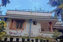 Tranquil Abode Home with private pond in Calicut