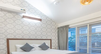 Ixora Suites (Near 100 Ft Rd & Indiranagar Metro Station) Room Type - Casa Studio Queen