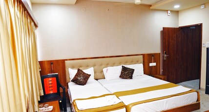 Hotel Sangam Residency Lodge Room Type - Deluxe Triple AC