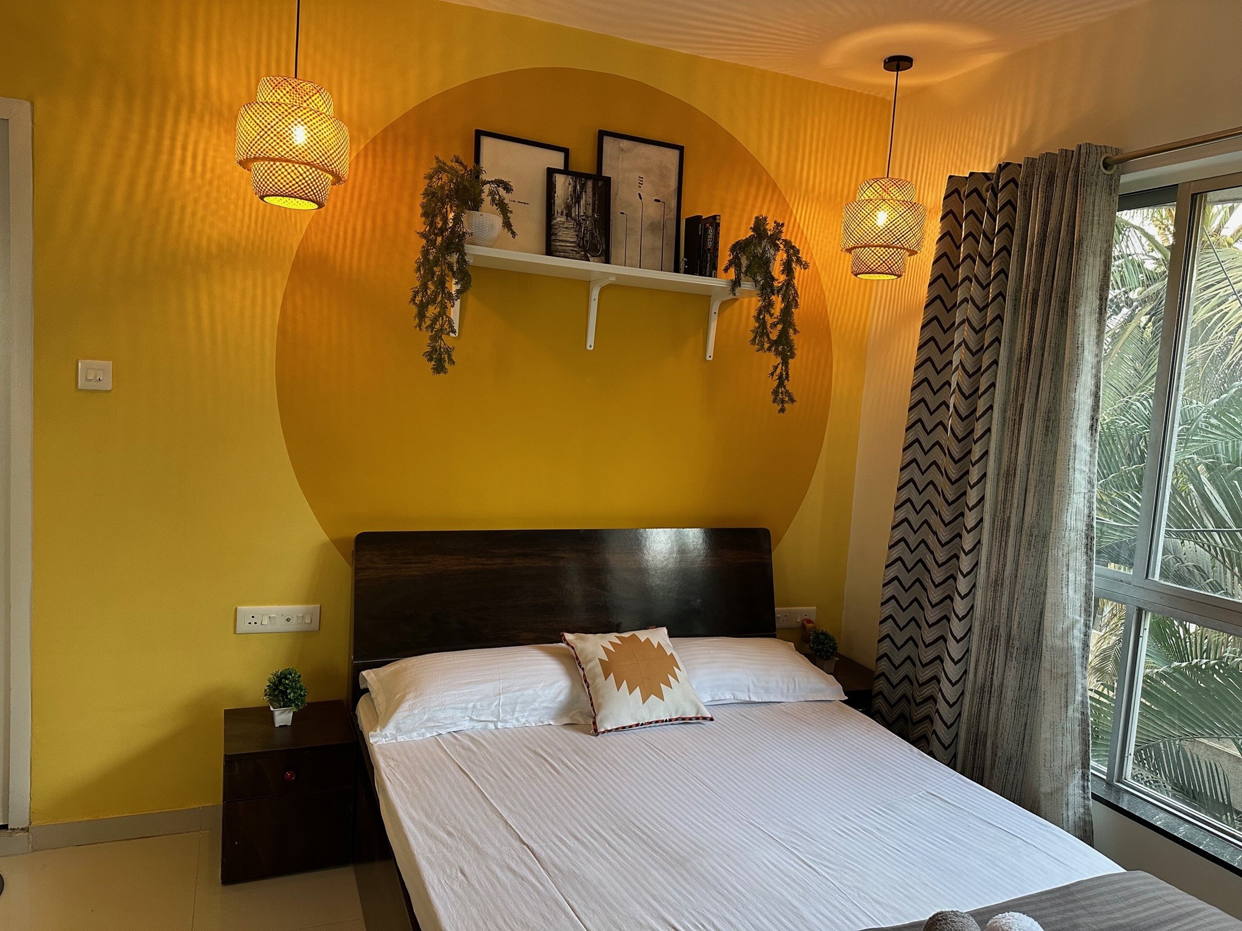 Sunflower Pvt Studio Room in Koregaon Park | AC Wifi Smart TV - Tap to explore photos