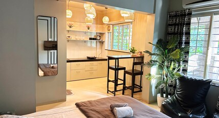 Studio Apartments by Abhibha Stays Room Type - The Studio: Premium studio with Balcony