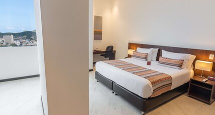 Best Western Plus Santa Marta Hotel Room Type - Suite-1 King Bed, Non-Smoking, Living Room, Coffee Maker, Mini Bar, Free Parking, Safe, Full Breakfa Best Western Plus Santa Marta Hotel Room Type - Suite-1 King Bed, Non-Smoking, Living Room, Coffee Maker, Mini Bar, Free Parking, Safe, Full Breakfa