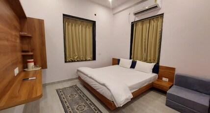 Trinetra Residency  1 Room Room Type - Bedroom