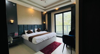 HOTEL SUDESH GANGA Room Type - Deluxe Room