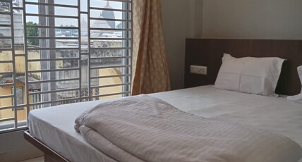 Shree Dham Palace Room Type - Deluxe Room With Temple View