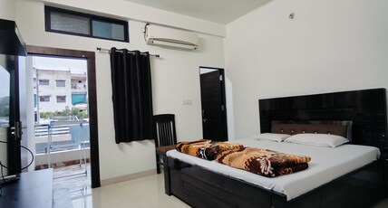 SHIVKRIPA STAY HOME Room Type - AC Deluxe Room with Balcony