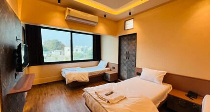 Hotel Vyankatesh Inn Room Type - Deluxe Triple Room